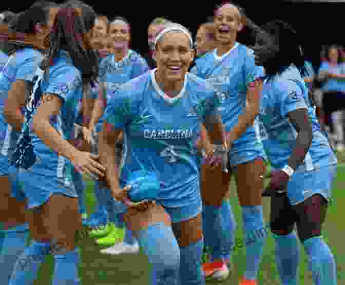 A Group Of University Of North Carolina Women's Soccer Players Celebrating A Championship Victory, Holding Up A Trophy And Wearing Blue Jerseys. The Man Watching: Anson Dorrance And The University Of North Carolina Women S Soccer Dynasty